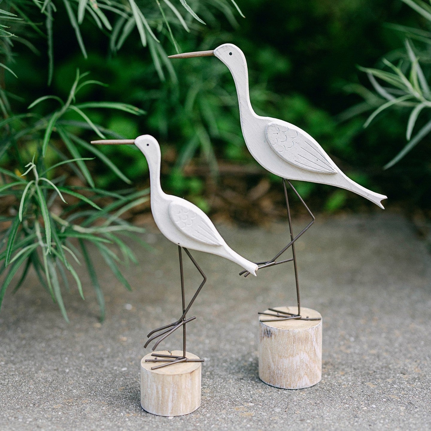Wooden stork on a stump