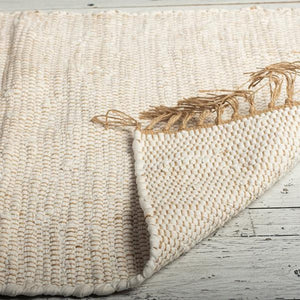 Woven mat with natural fibers on a wooden surface