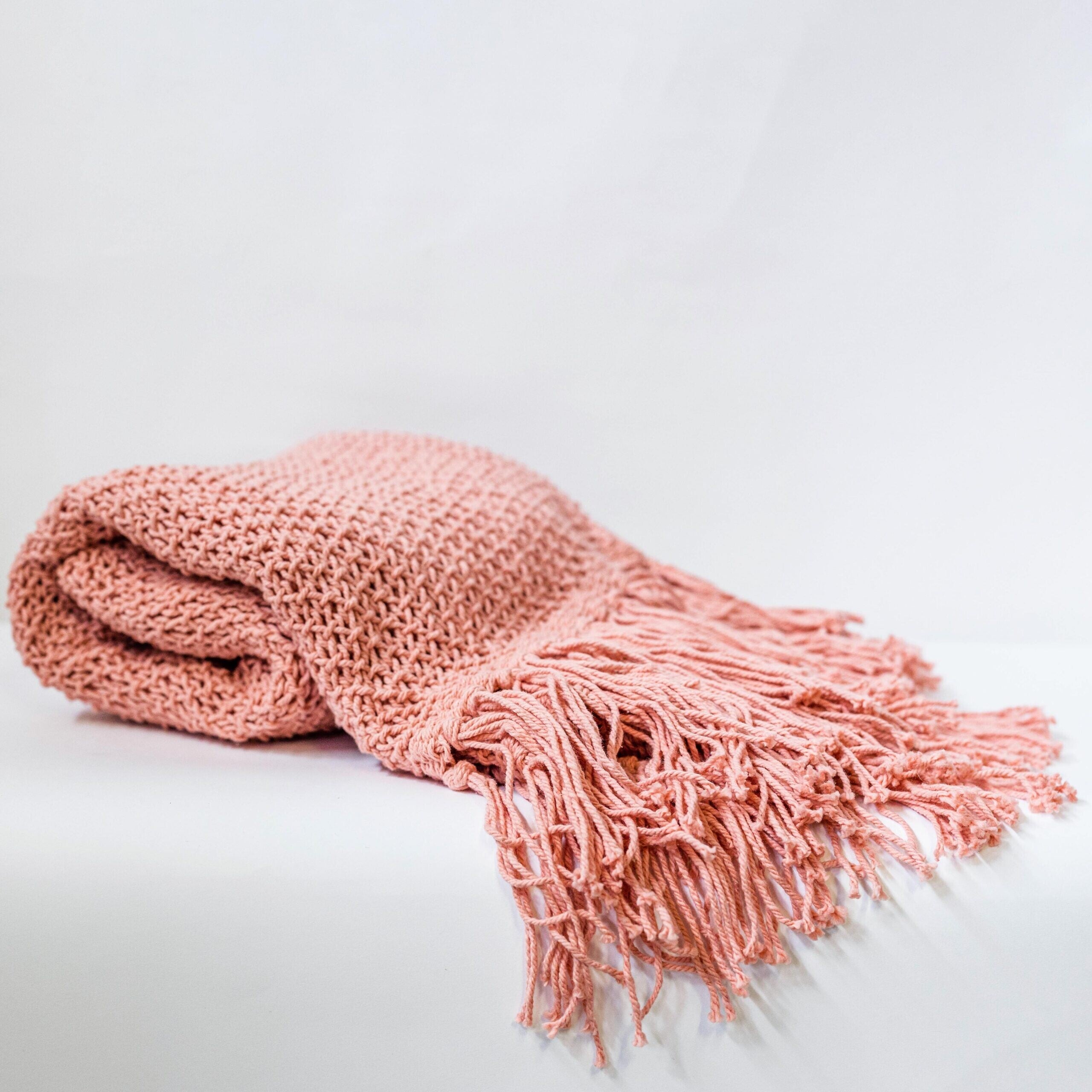 Knitted Peach Cotton Throw With Tassels