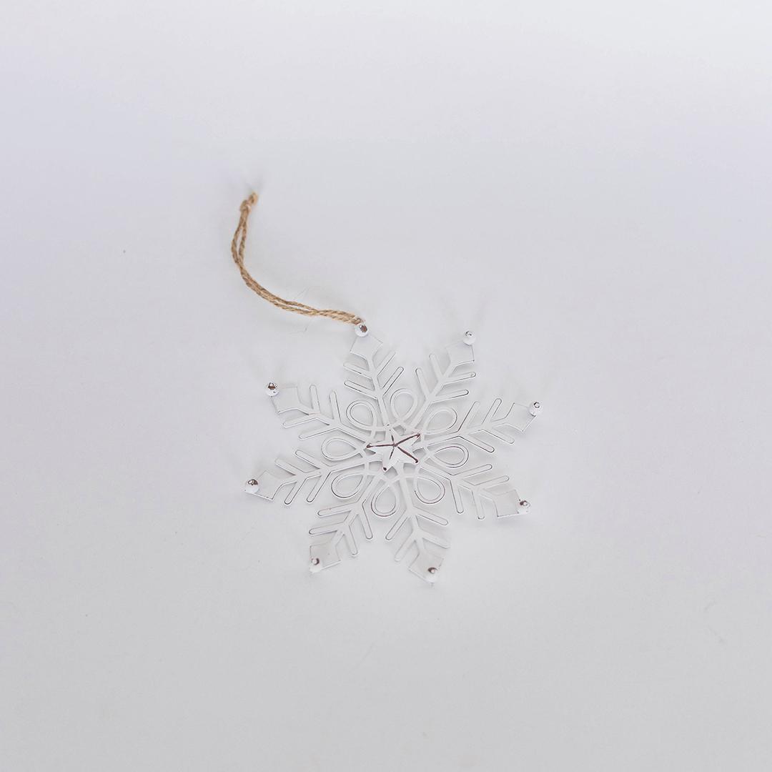 Decorative snowflake ornament on a white background
