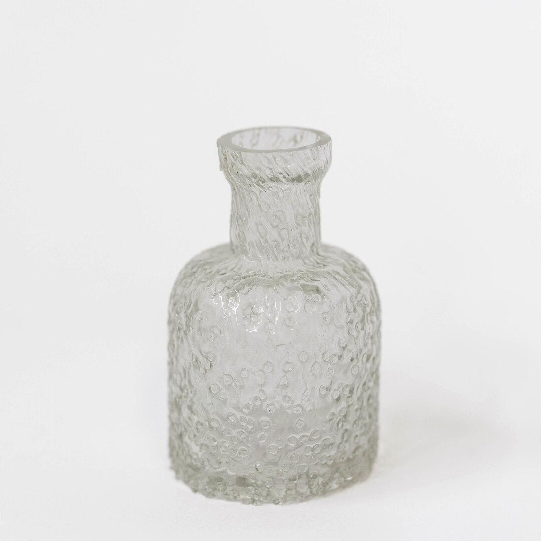 Glass bottle textured