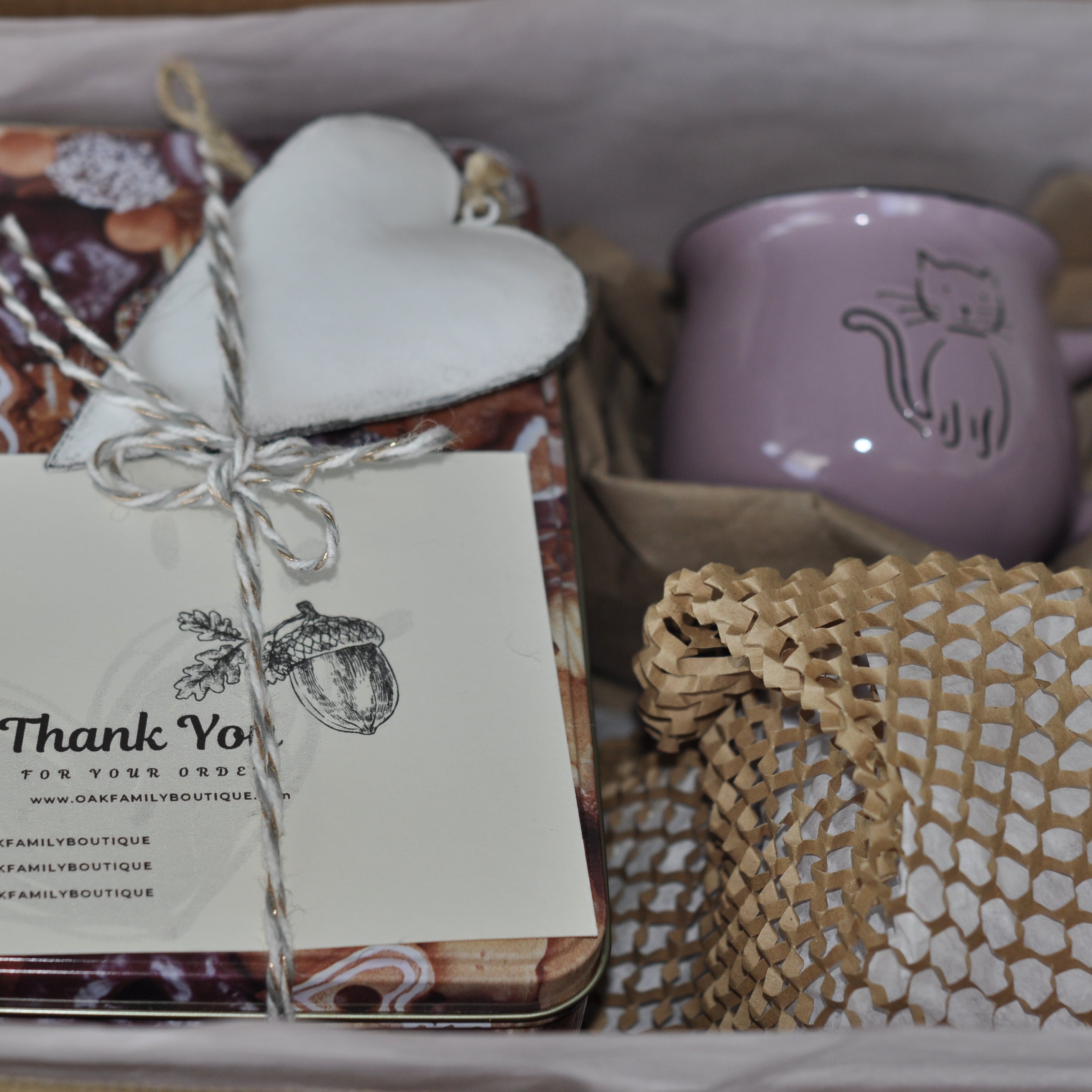 Gift set with a mug, cookies, and a card in a box