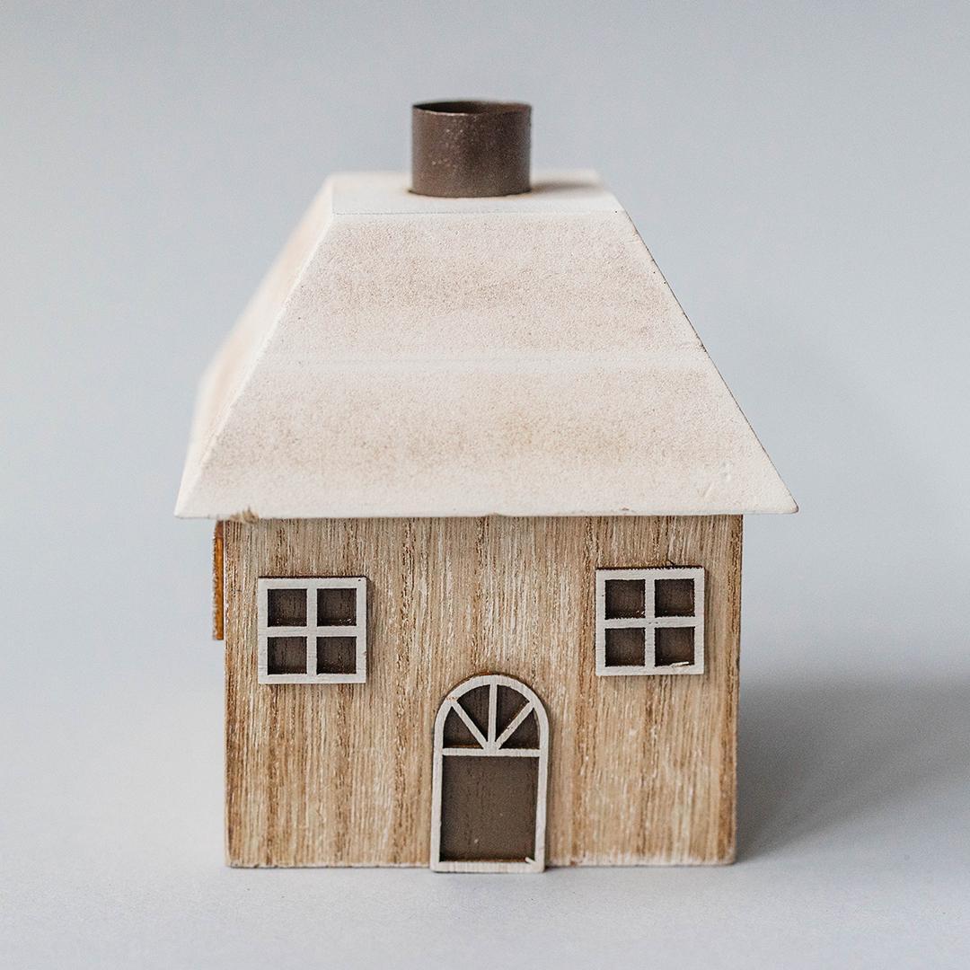 Wooden house with a metal chimney