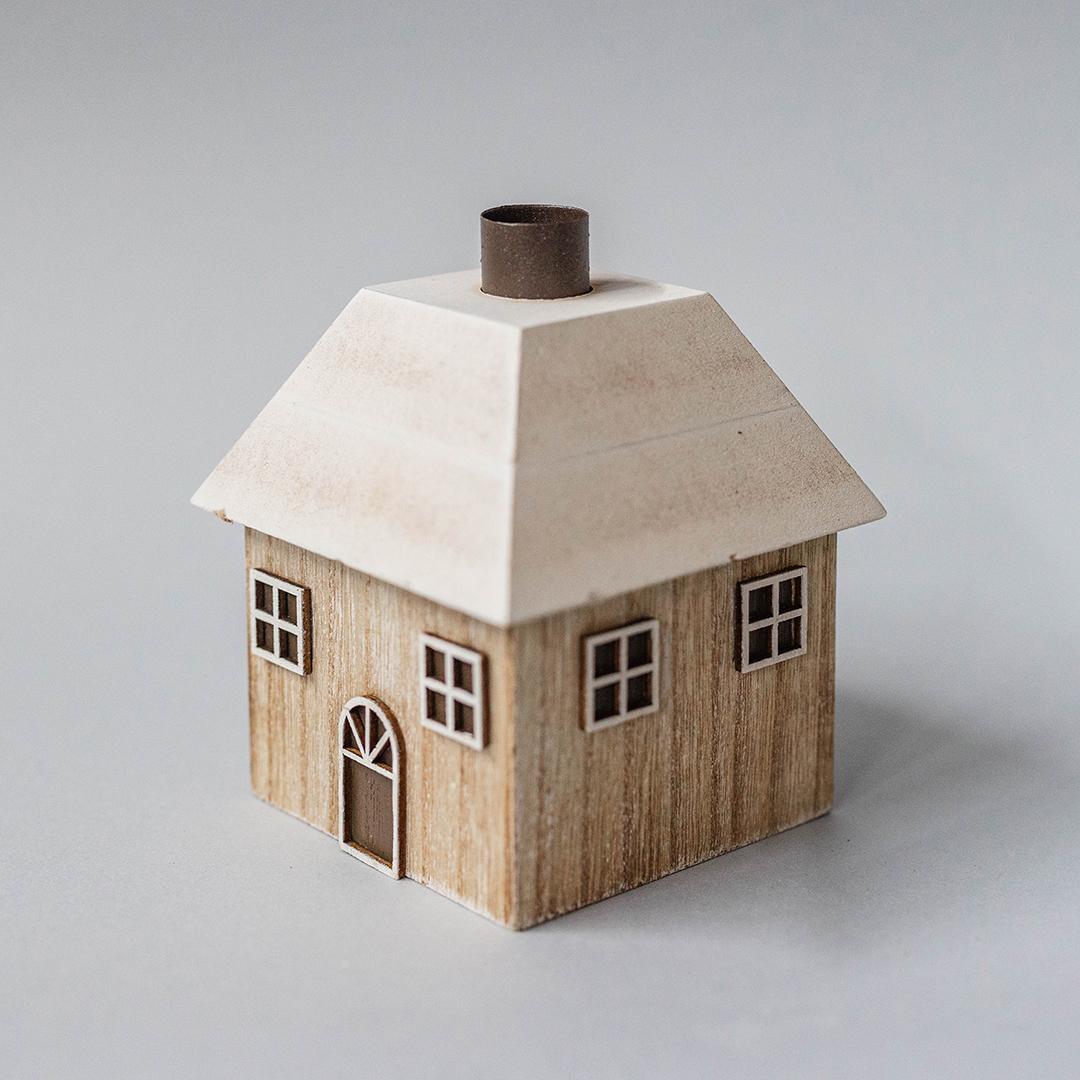 Wooden house with a metal chimney