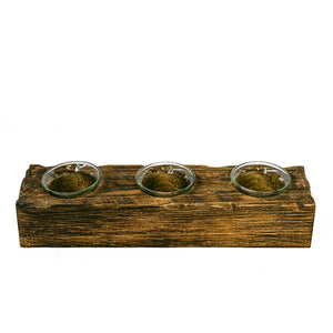 Wooden tray with three glass bowls on a white background