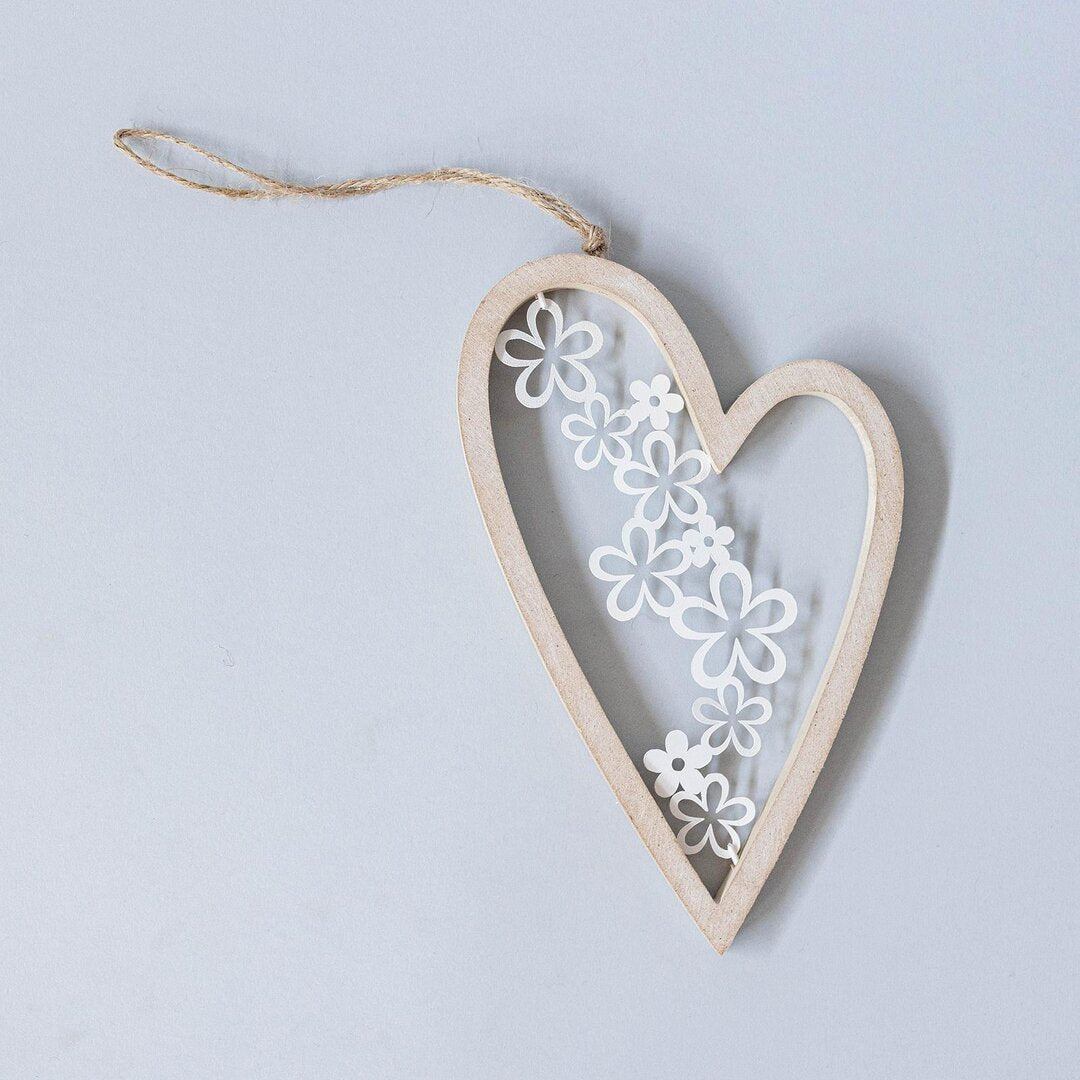 Wooden heart ornament with metal flowers