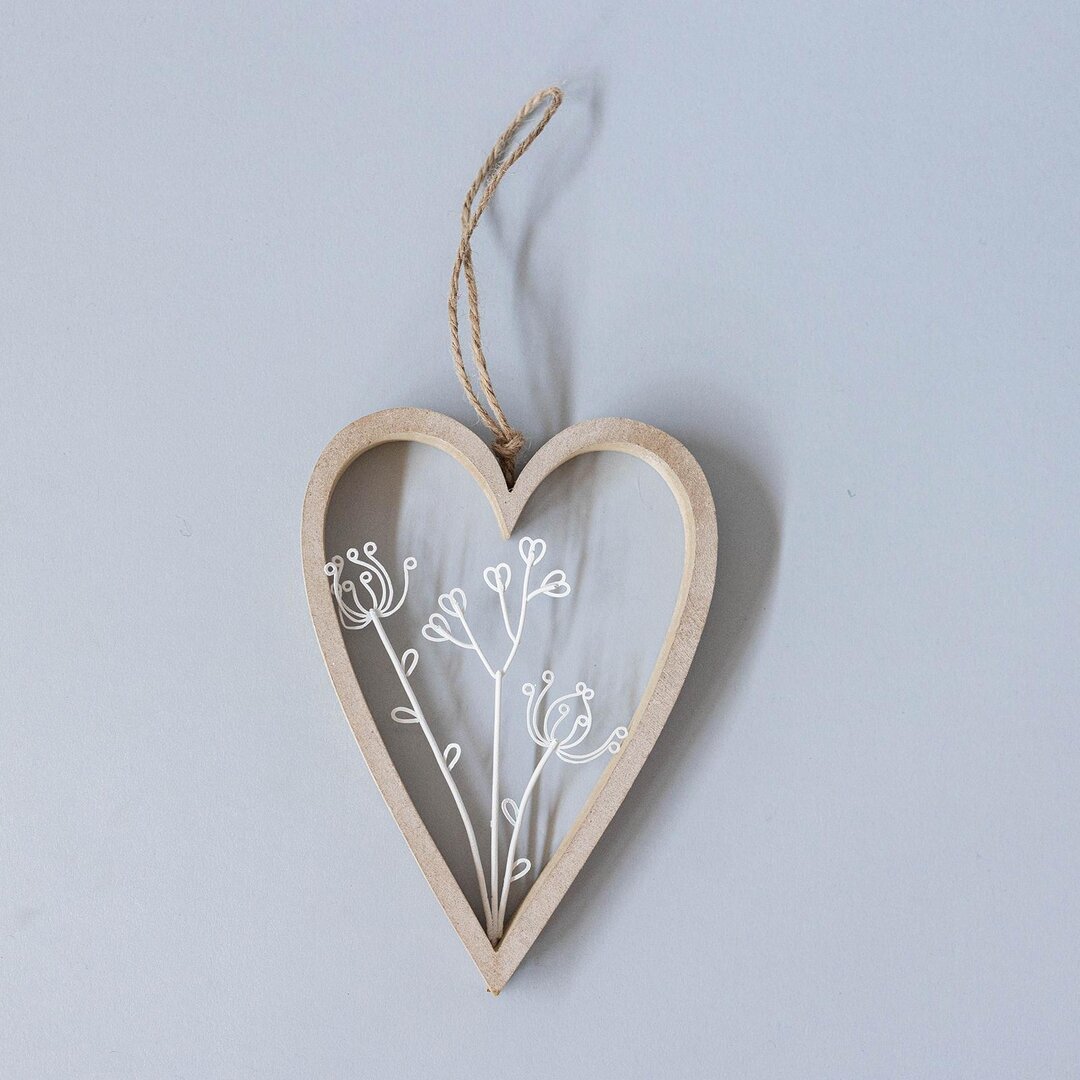 Wooden heart ornament with flowers cutout