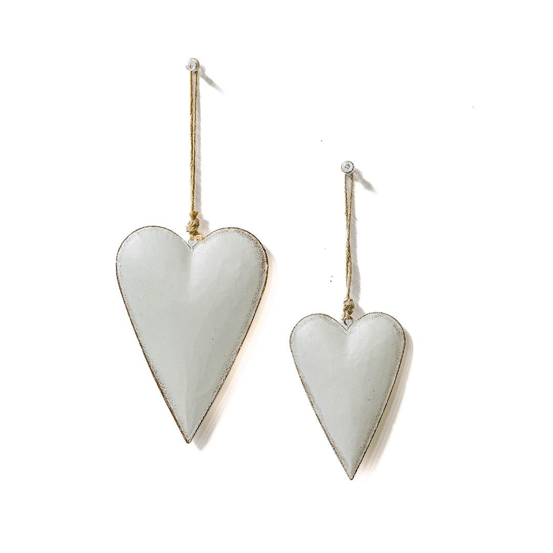 white metal heart-shaped ornaments 