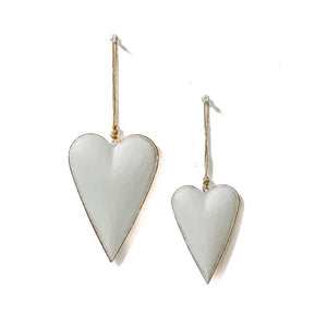 white metal heart-shaped ornaments 
